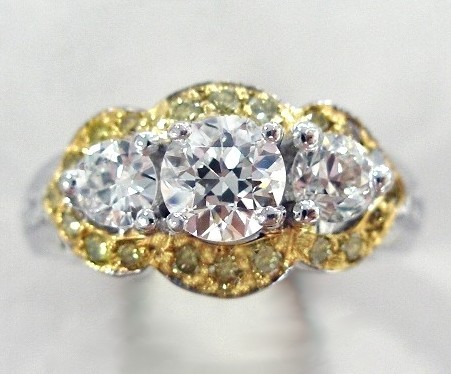 Ring with yellow diamonds after makeover